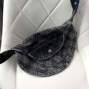 A black and gray, Jean Crossbody, or around your waist bag/purse..